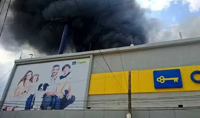 Fallece mujer por incendio de tienda Coppel en Veracruz; su hijo se salvó