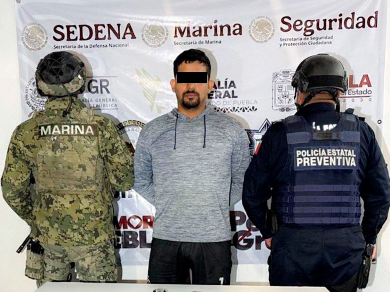 Tras persecución cae Juan José con arma en calles de Izúcar