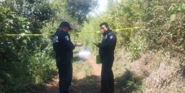 Localizan cadáver de un hombre dentro de bolsas negras en Tlaola