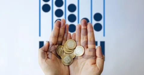 manos-monedas-el financiero